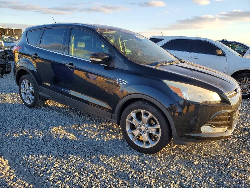 Photo 4 from auction – 2013 FORD ESCAPE with VIN 1FMCU0HXXDUC37348