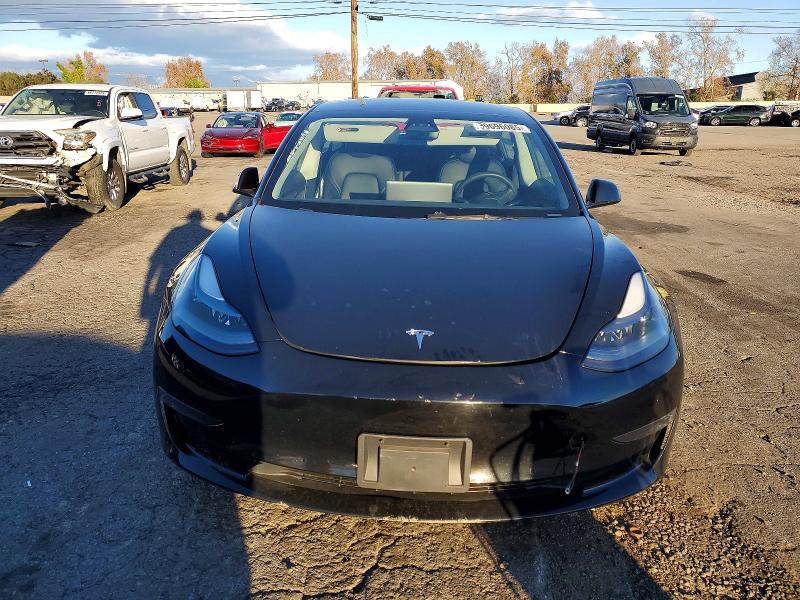 Photo 5 from auction – 2022 TESLA MODEL 3 with VIN 5YJ3E1EB7NF108347