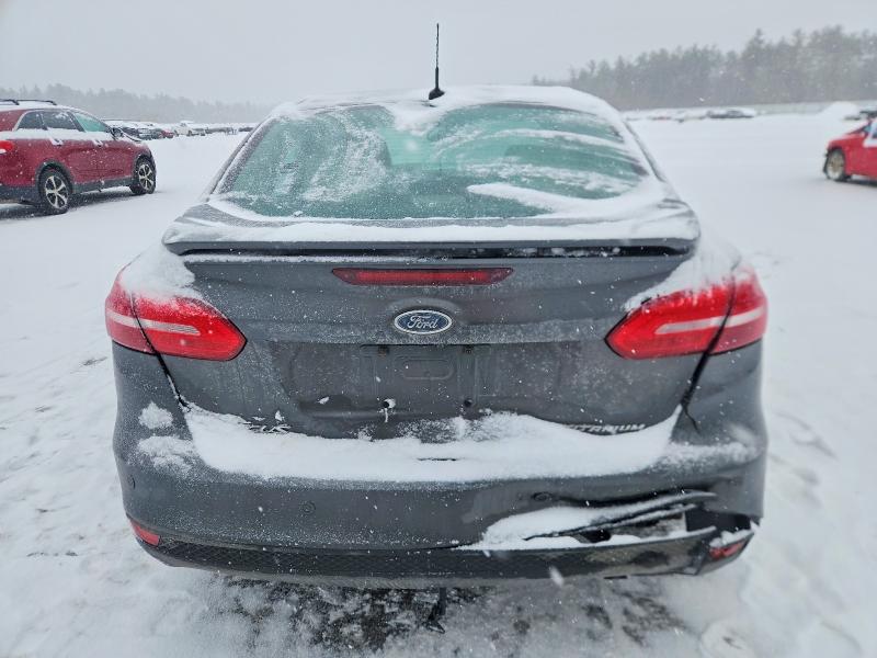 Photo 6 from auction – 2015 FORD FOCUS with VIN 1FADP3J21FL226740