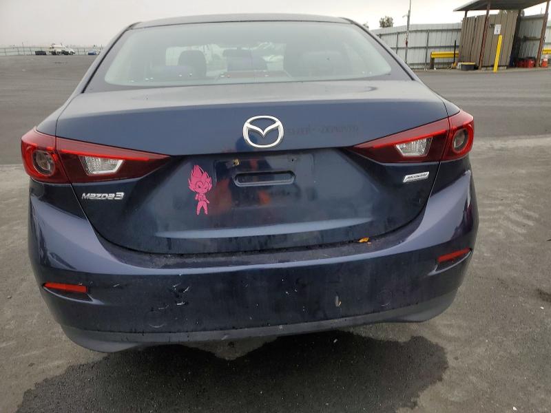 Photo 6 from auction – 2014 MAZDA 3 SV with VIN JM1BM1T74E1117576