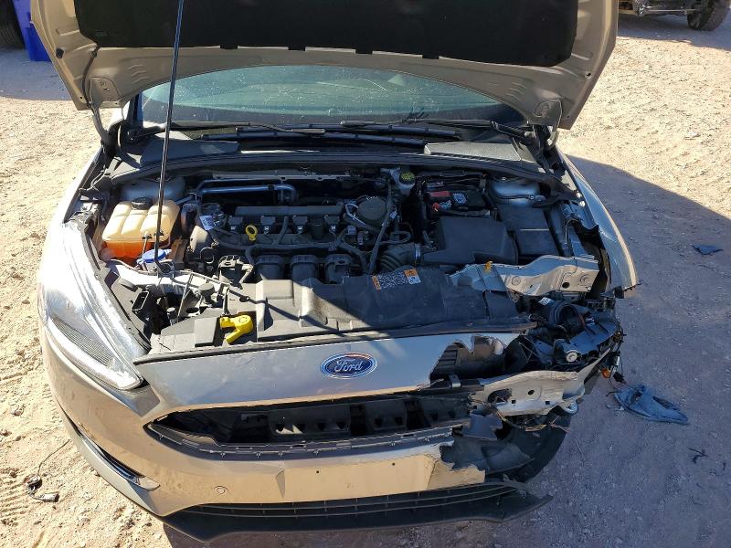 Photo 11 from auction – 2015 FORD FOCUS TITA with VIN 1FADP3N24FL348423