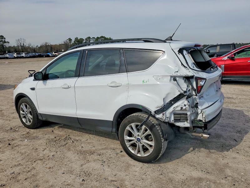 Photo 2 from auction – 2018 FORD ESCAPE with VIN 1FMCU0GD6JUD43718