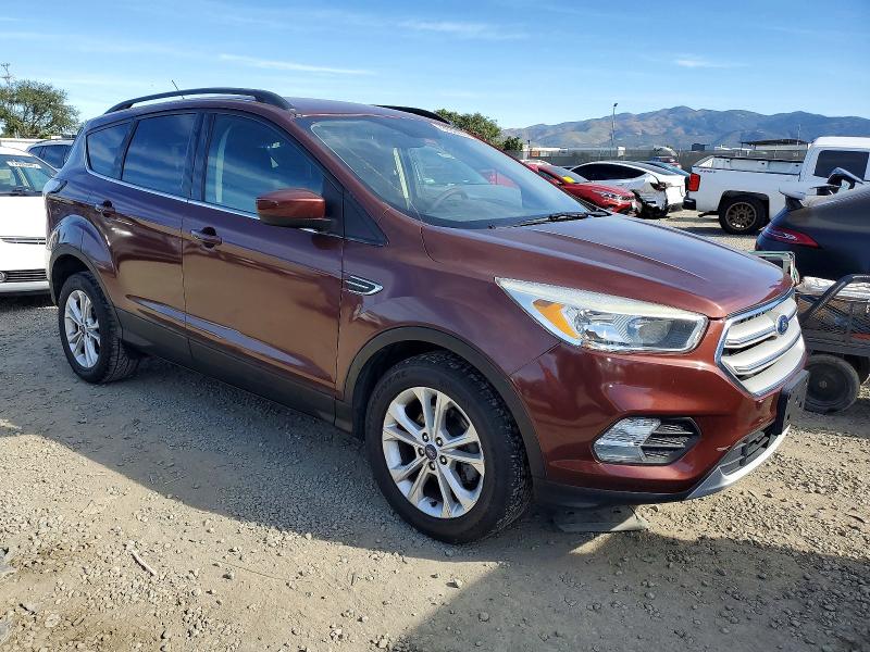 Photo 4 from auction – 2018 FORD ESCAPE SE with VIN 1FMCU0GD2JUA04695