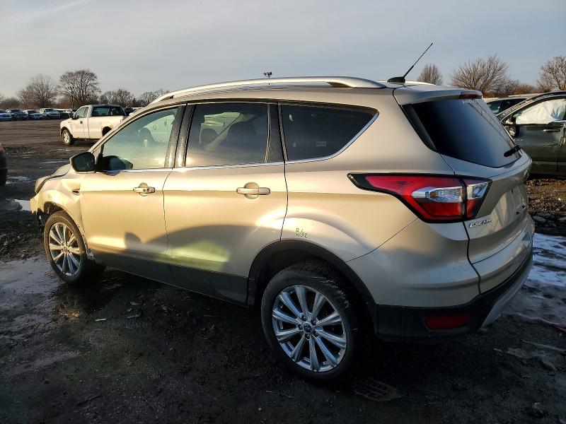 Photo 2 from auction – 2017 FORD ESCAPE TIT with VIN 1FMCU9J91HUD60736