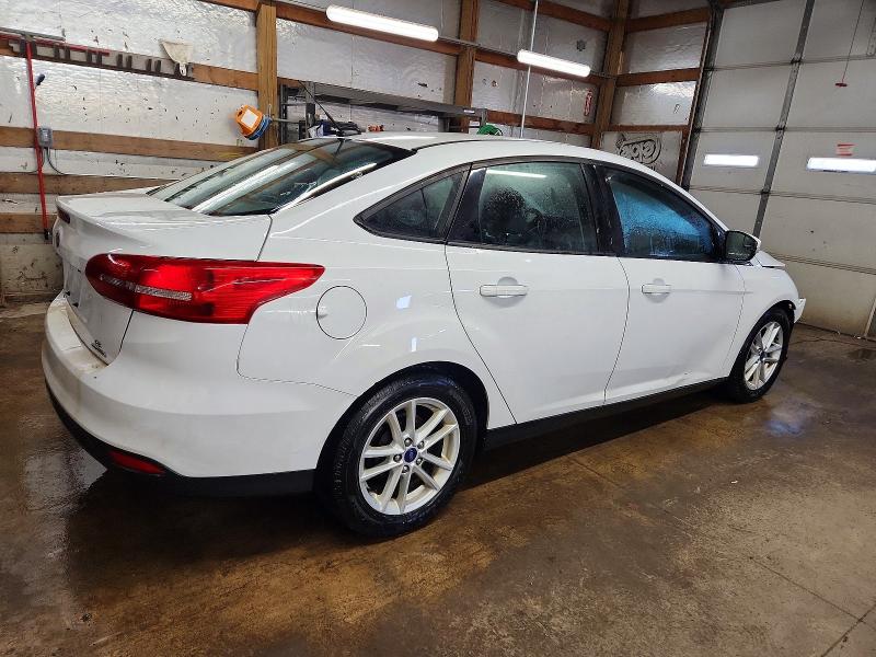 Photo 3 from auction – 2016 FORD FOCUS SE with VIN 1FADP3F22GL364846
