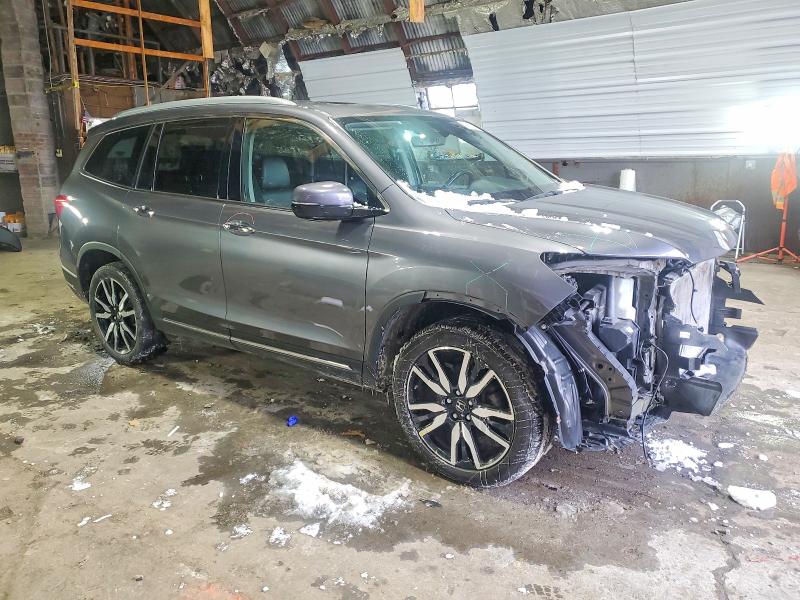 Photo 4 from auction – 2021 HONDA PILOT TOUR with VIN 5FNYF6H91MB049562