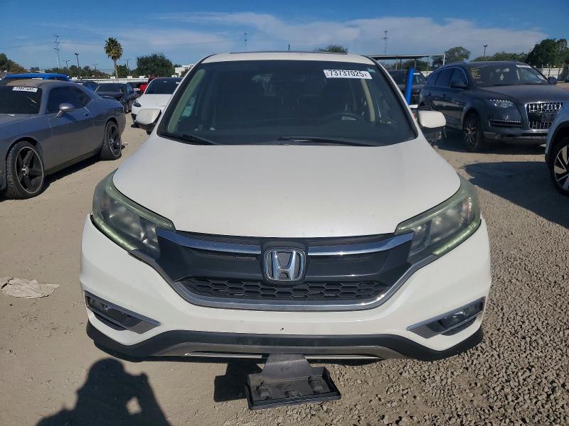 Photo 5 from auction – 2015 HONDA CR-V EX with VIN 5J6RM4H57FL079896