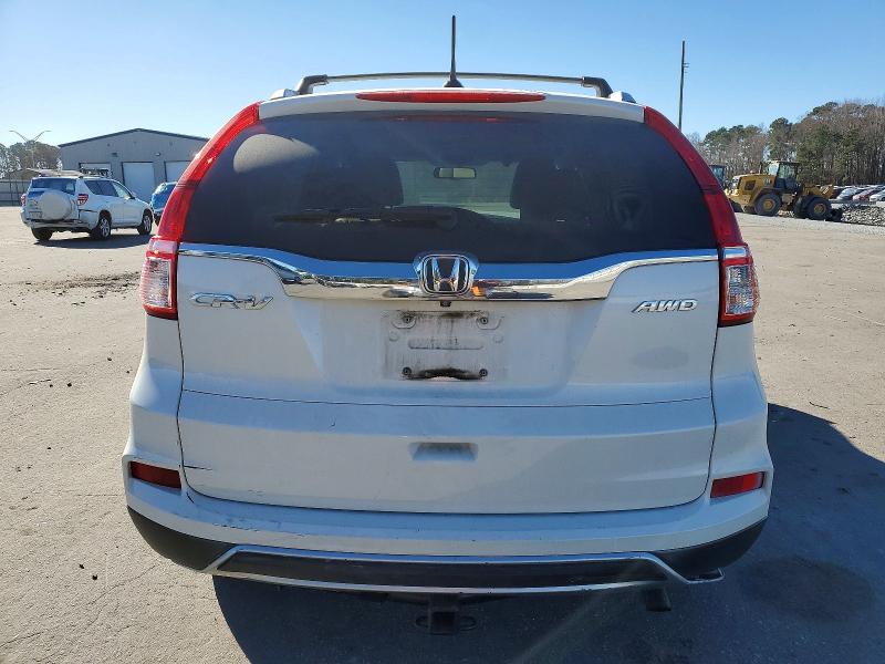 Photo 6 from auction – 2015 HONDA CR-V EXL with VIN 5J6RM4H78FL060968