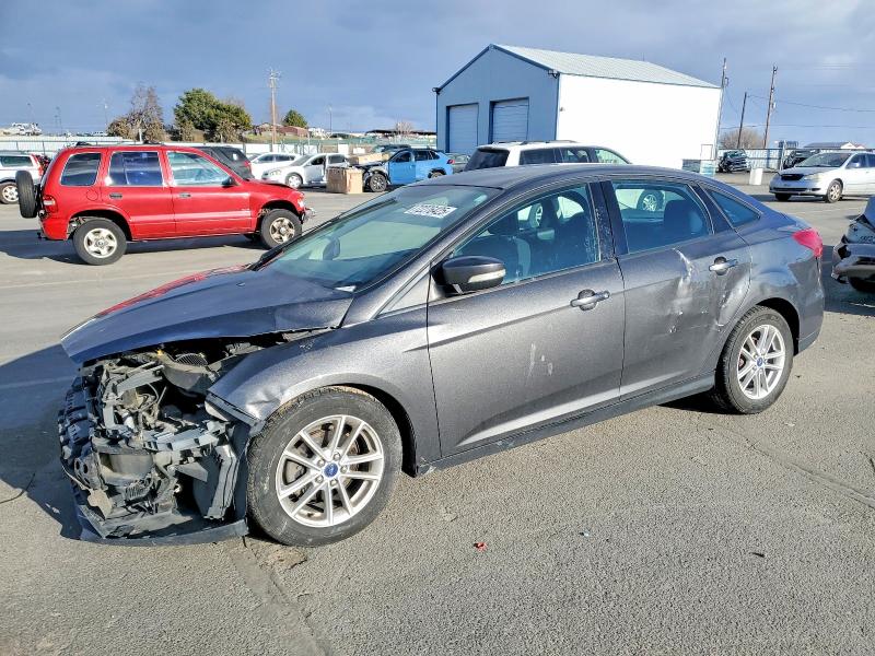 FORD FOCUS SE 2015 with VIN 1FADP3F20FL248611 - Photo from auction