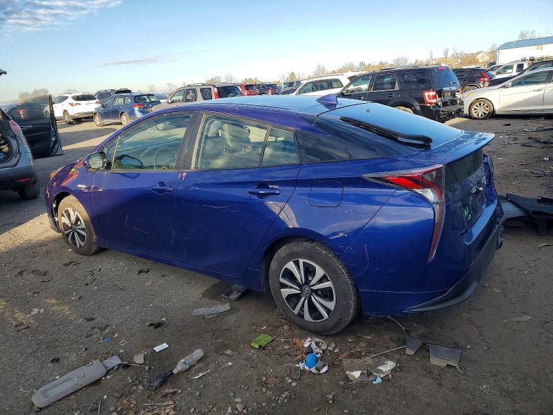 Photo 2 from auction – 2016 TOYOTA PRIUS with VIN JTDKARFUXG3505024