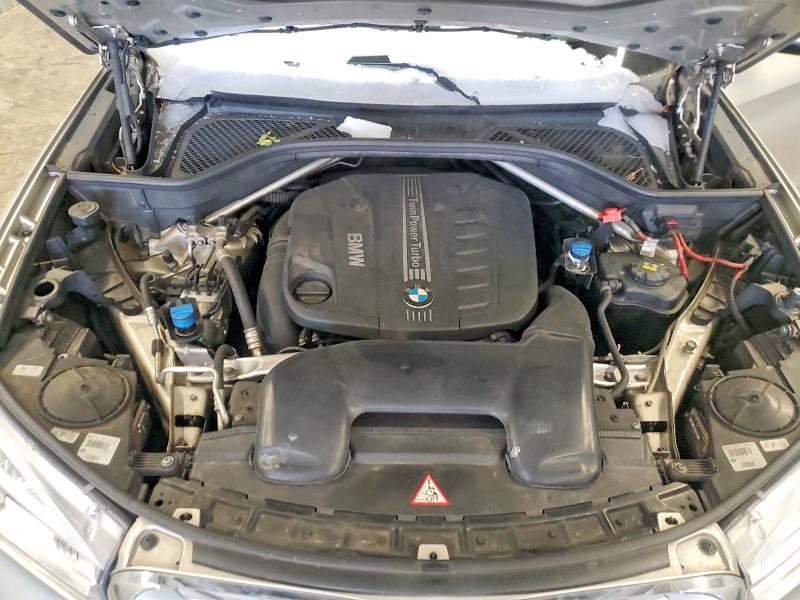 Photo 12 from auction – 2014 BMW X5 with VIN 5UXKS4C52E0J93906