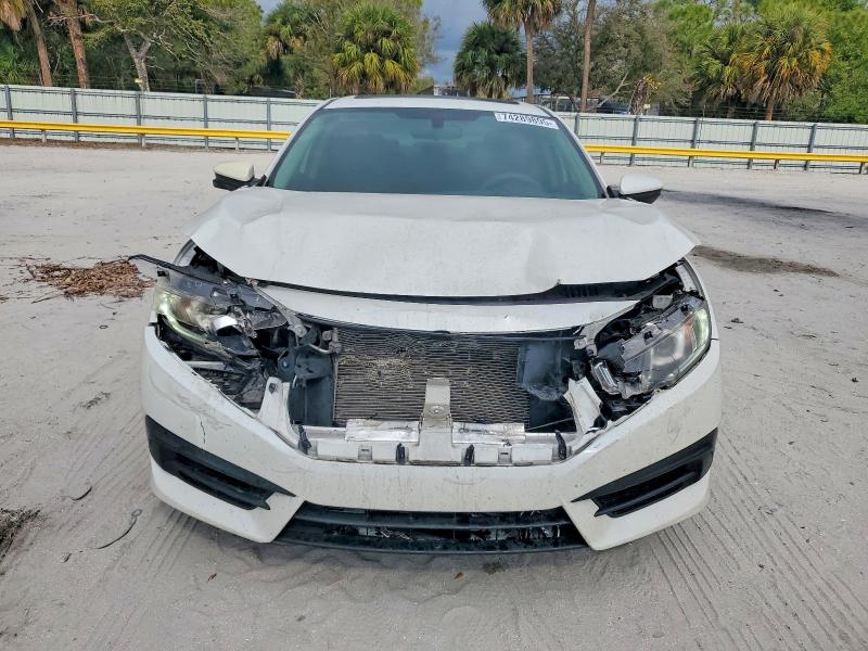 Фото 5 с аукциона – 2017 HONDA CIVIC EX с VIN 19XFC2F74HE005884