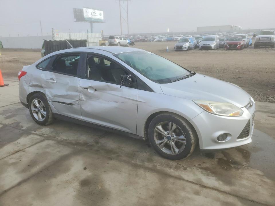 Photo 4 from auction – 2014 FORD FOCUS with VIN 1FADP3F24EL462192