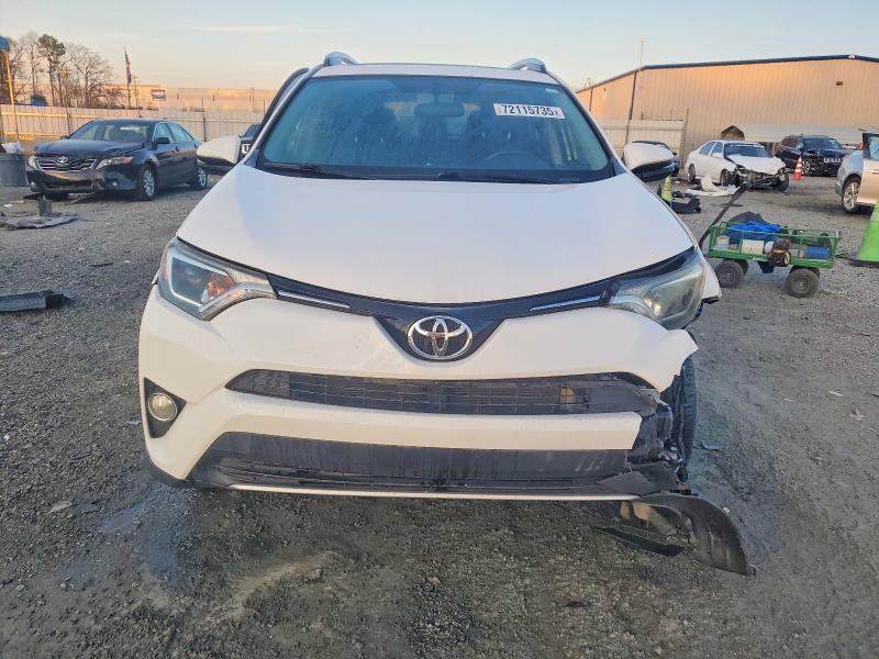 Photo 5 from auction – 2016 TOYOTA RAV4 with VIN JTMWFREV5GJ074195