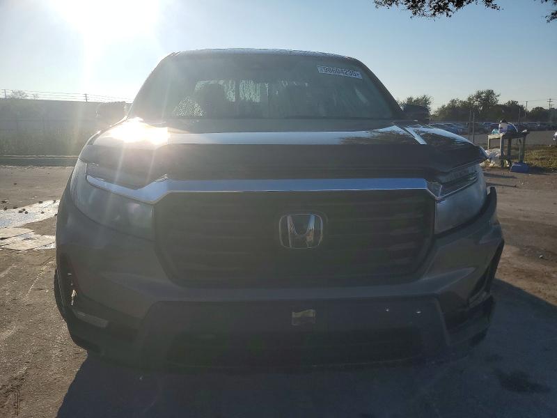 Photo 5 from auction – 2022 HONDA RIDGELINE with VIN 5FPYK3F74NB013000