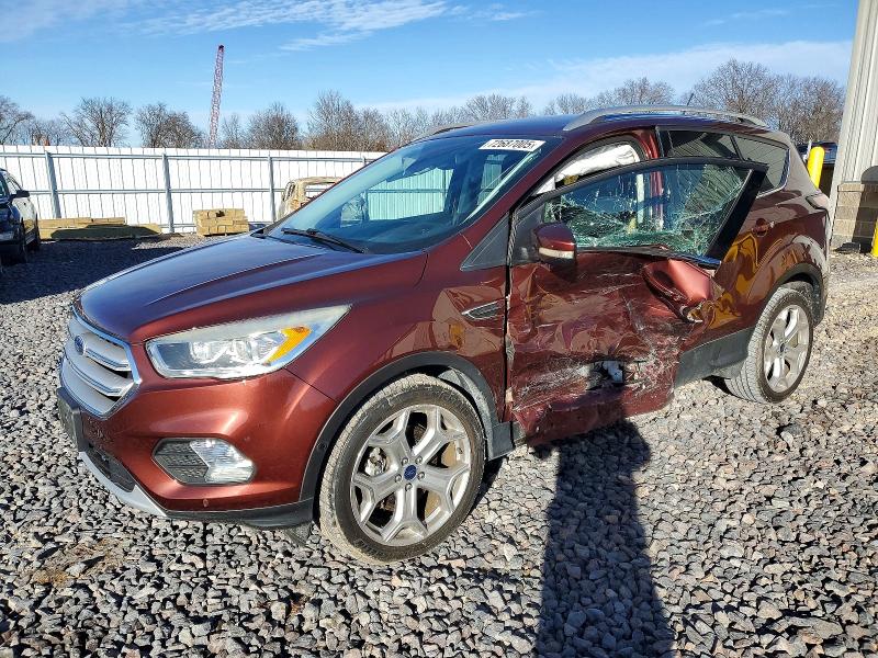 FORD ESCAPE TIT 2018 with VIN 1FMCU0J94JUA40635 - Photo from auction