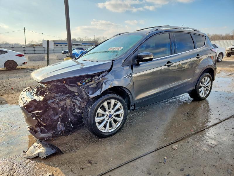 FORD ESCAPE TIT 2017 with VIN 1FMCU0J97HUA59657 - Photo from auction