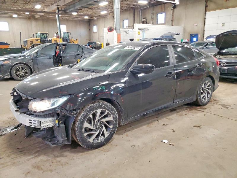 HONDA CIVIC 2016 with VIN 19XFC2F79GE035882 - Photo from auction