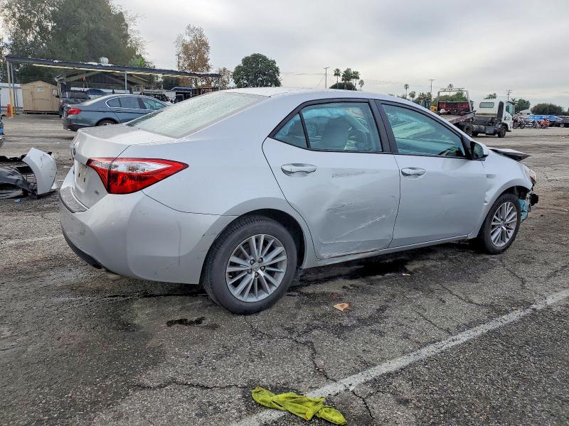 Photo 3 from auction – 2014 TOYOTA COROLLA L with VIN 5YFBURHE0EP121352