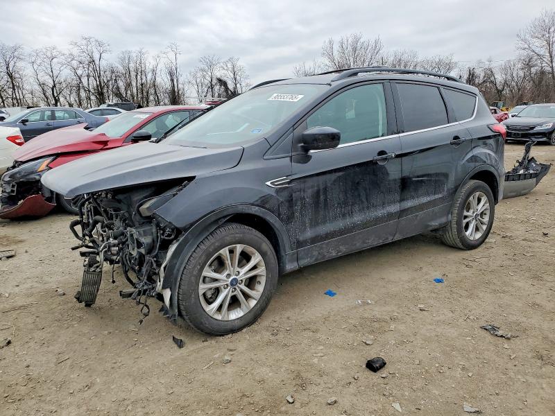 FORD ESCAPE 2019 with VIN 1FMCU9HD4KUB92186 - Photo from auction