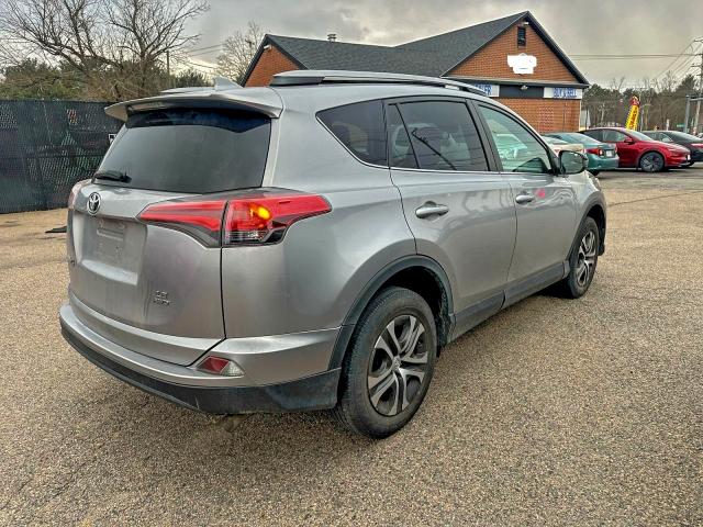 Photo 4 from auction – 2017 TOYOTA RAV4 LE with VIN 2T3BFREV8HW631702