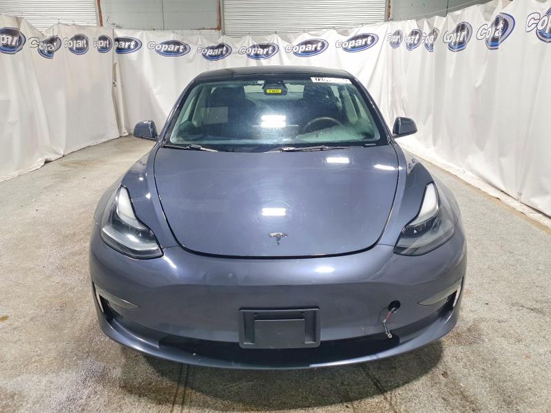 Photo 5 from auction – 2022 TESLA MODEL 3 with VIN 5YJ3E1EA3NF372155