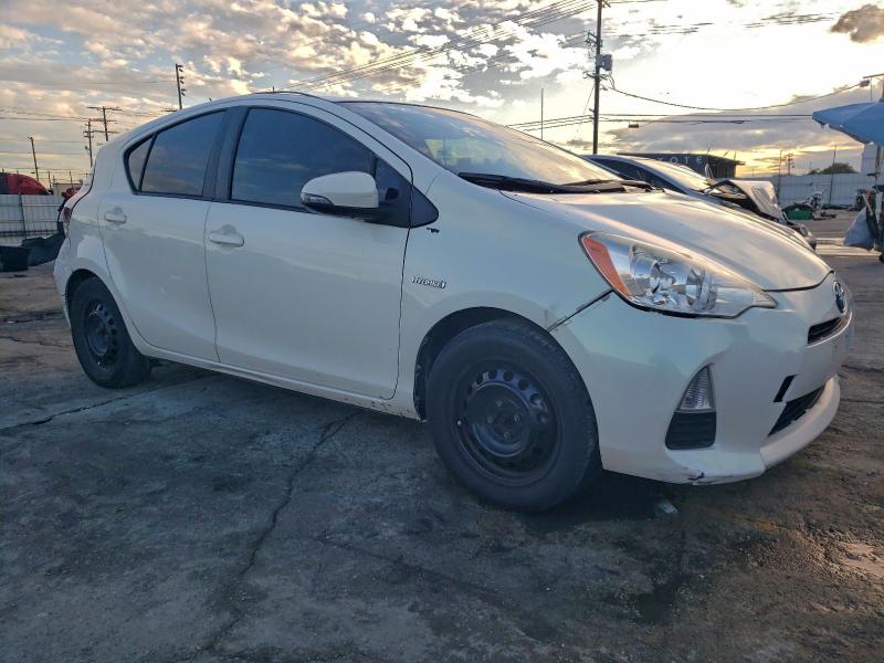 Photo 4 from auction – 2014 TOYOTA PRIUS C with VIN JTDKDTB38E1062429