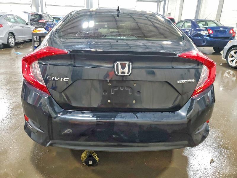 Photo 6 from auction – 2018 HONDA CIVIC TOUR with VIN 19XFC1F97JE001426