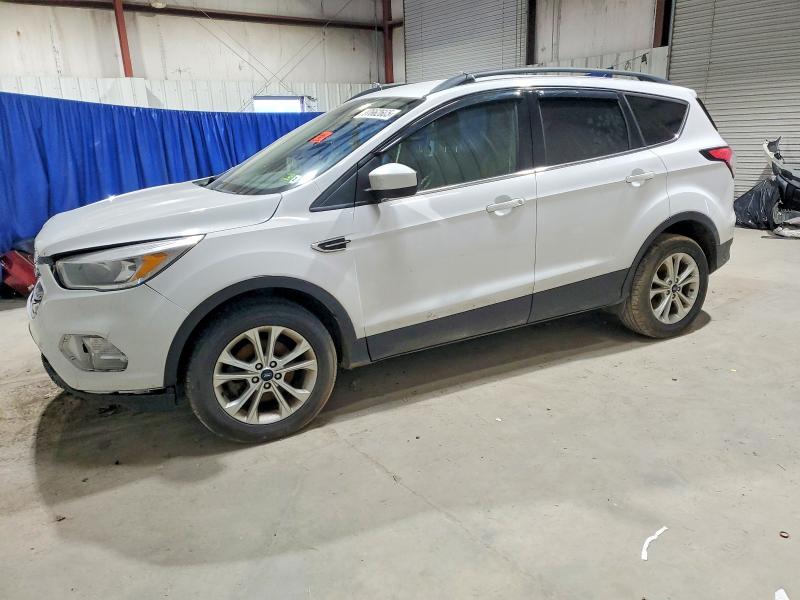 FORD ESCAPE 2018 with VIN 1FMCU0GD8JUC36878 - Photo from auction