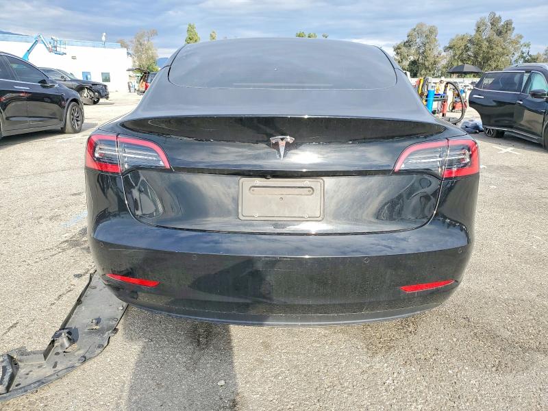 Photo 6 from auction – 2021 TESLA MODEL 3 with VIN 5YJ3E1EA3MF073179