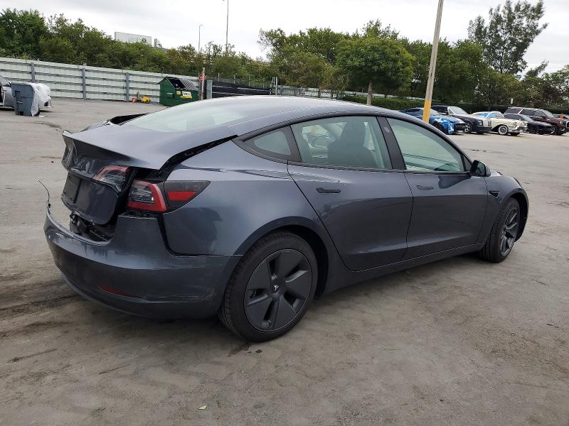 Photo 3 from auction – 2023 TESLA MODEL 3 with VIN 5YJ3E1EA9PF677128