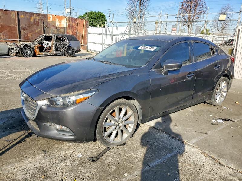 MAZDA 3 TOURING 2017 with VIN JM1BN1V73H1128163 - Photo from auction