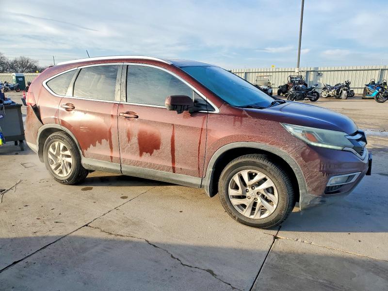 Photo 4 from auction – 2015 HONDA CR-V EXL with VIN 2HKRM3H74FH510653