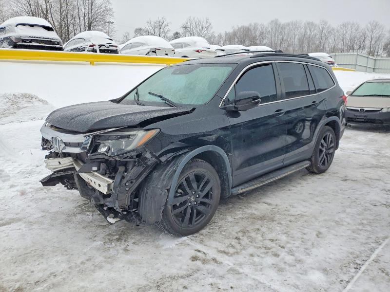 HONDA PILOT 2020 with VIN 5FNYF5H59LB000986 - Photo from auction