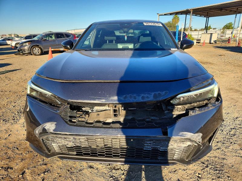 Photo 5 from auction – 2025 HONDA CIVIC with VIN 2HGFE4F83SH331347