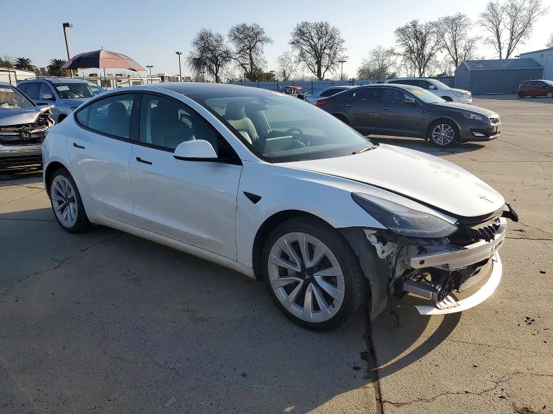 Photo 4 from auction – 2022 TESLA MODEL 3 with VIN 5YJ3E1EA2NF184940
