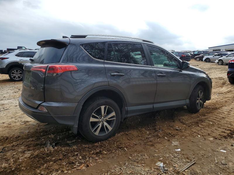 Photo 3 from auction – 2018 TOYOTA RAV4 with VIN 2T3WFREV7JW516922