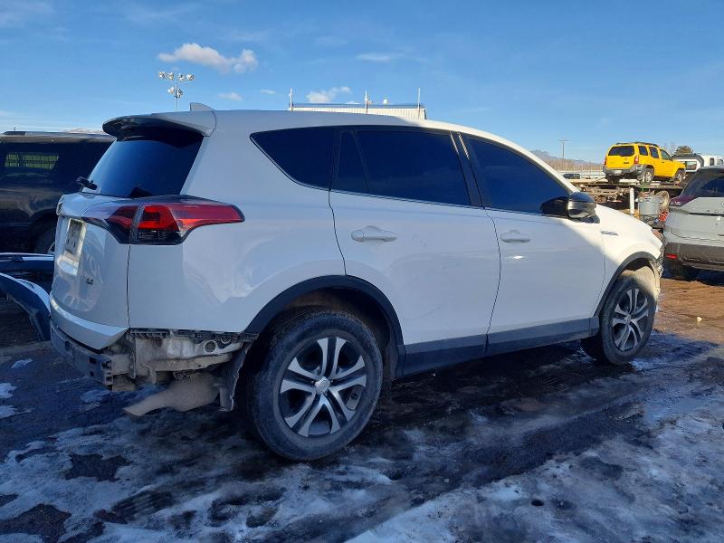 Photo 3 from auction – 2018 TOYOTA RAV4 LE with VIN 2T3ZFREV5JW446527