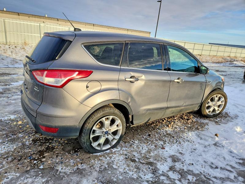 Photo 3 from auction – 2013 FORD ESCAPE with VIN 1FMCU9HX3DUC37101