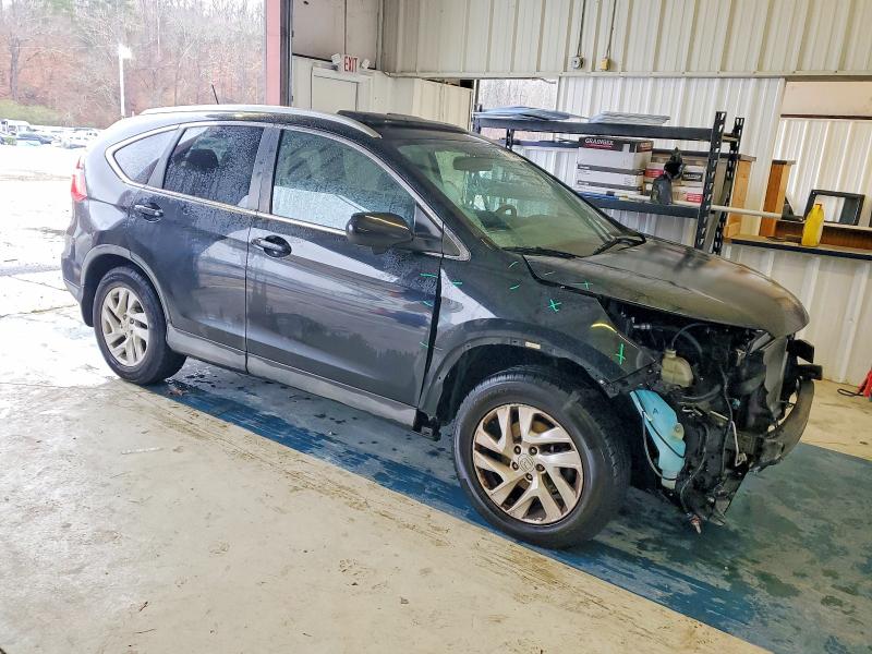 Photo 4 from auction – 2015 HONDA CR-V EXL with VIN 2HKRM3H74FH553924