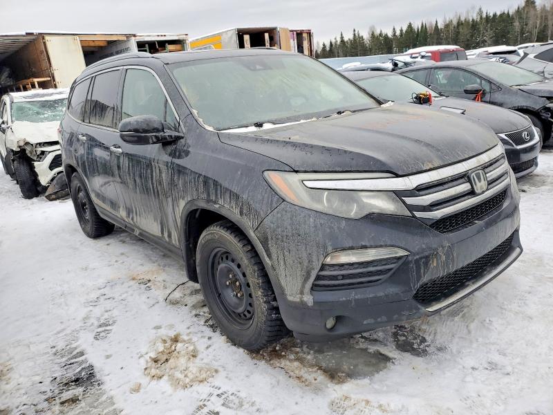 Photo 4 from auction – 2016 HONDA PILOT TOUR with VIN 5FNYF6H97GB510171
