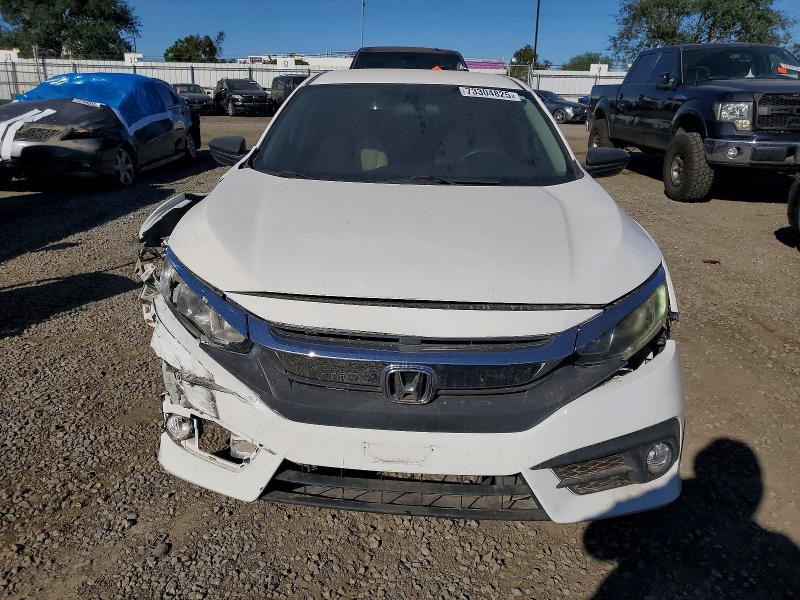 Photo 5 from auction – 2018 HONDA CIVIC LX with VIN 2HGFC2F55JH512254