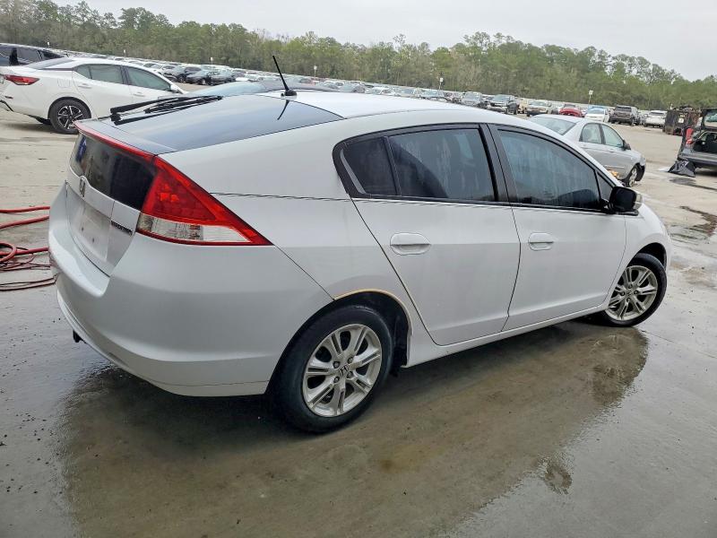Photo 3 from auction – 2010 HONDA INSIGHT EX with VIN JHMZE2H78AS021673