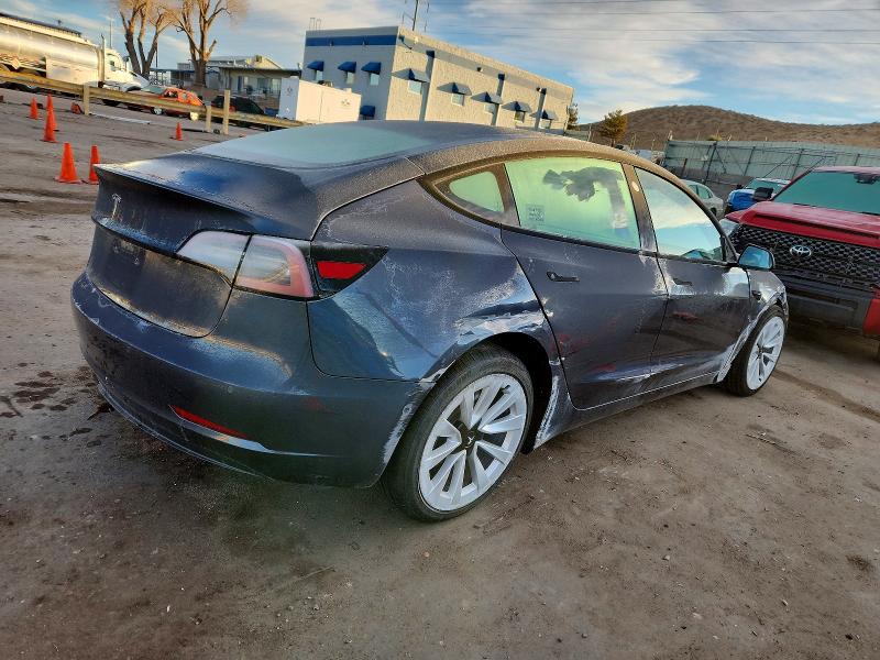 Photo 3 from auction – 2022 TESLA MODEL 3 with VIN 5YJ3E1EAXNF370323