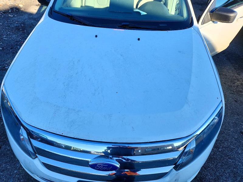 Photo 11 from auction – 2011 FORD FUSION S with VIN 3FAHP0GA7BR257758