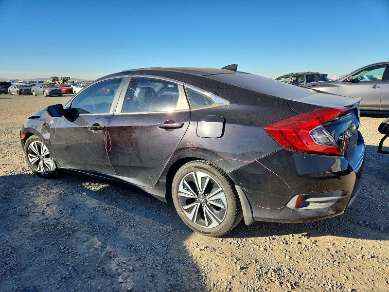 Photo 2 from auction – 2016 HONDA CIVIC EX with VIN 2HGFC1F36GH632324