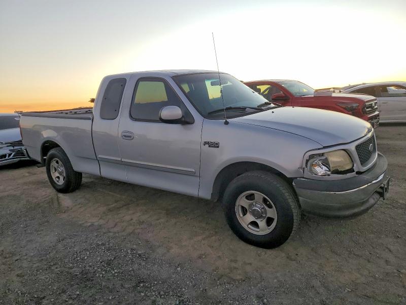 Photo 4 from auction – 2002 FORD F150 with VIN 2FTRX17202CA17411