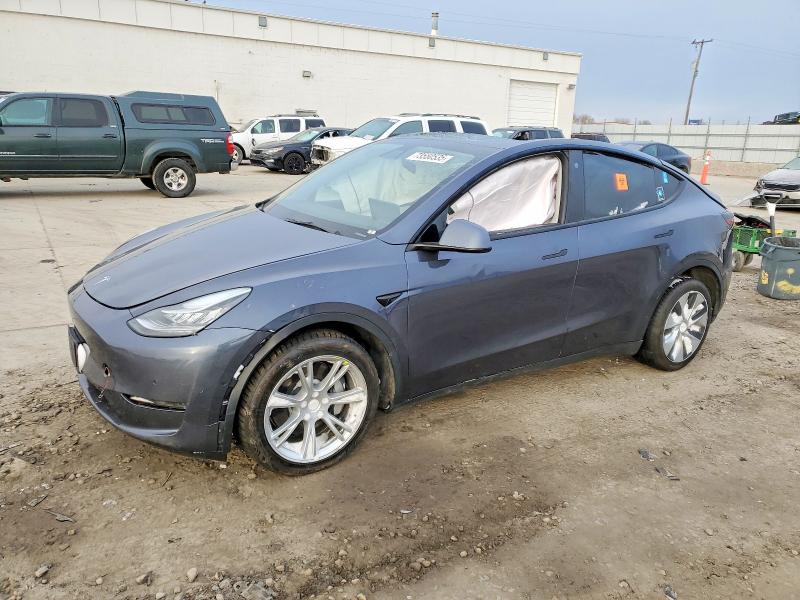 TESLA MODEL Y 2022 with VIN 7SAYGDEE0NF310378 - Photo from auction