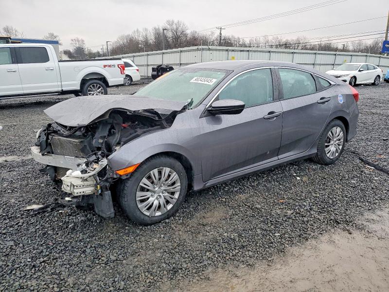 HONDA CIVIC LX 2016 with VIN 2HGFC2F52GH526556 - Photo from auction