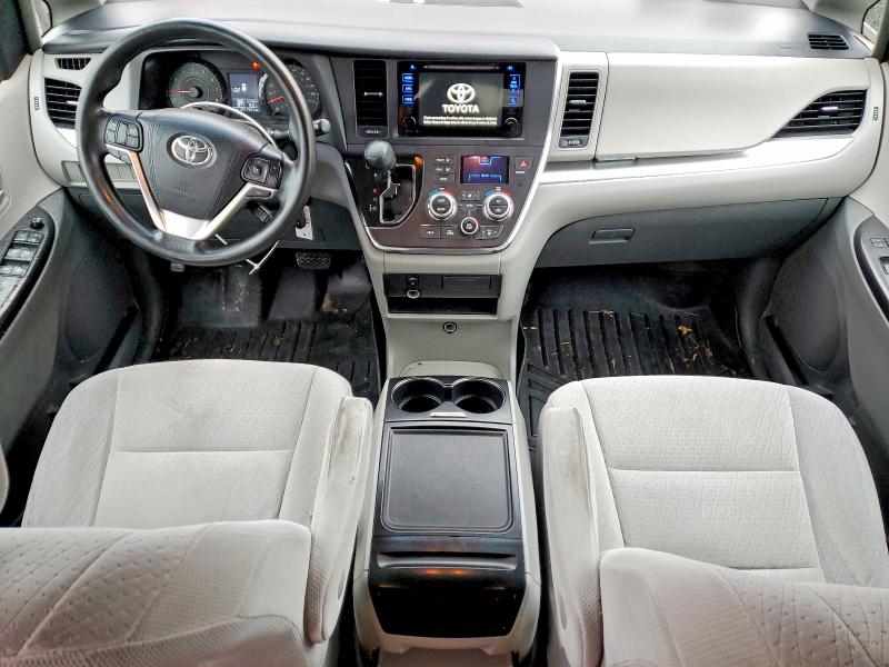 Photo 8 from auction – 2015 TOYOTA SIENNA LE with VIN 5TDKK3DC9FS573073